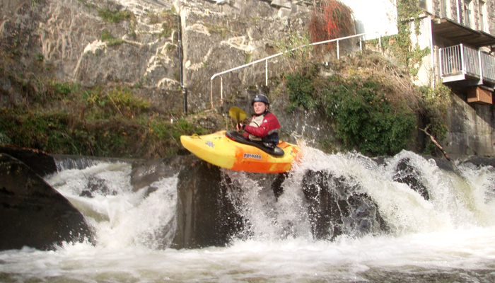 Paddling rapids at Rhayader on Upper Wye